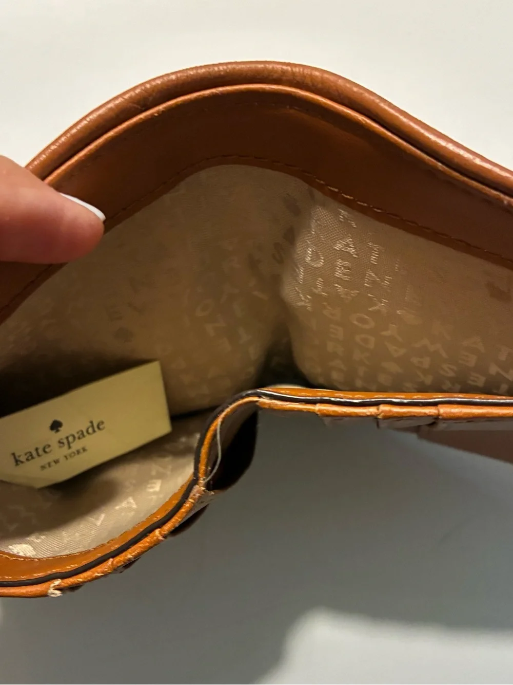 Kate Spade New York EUC Leila Slim Bifold Tan Leather Wallet